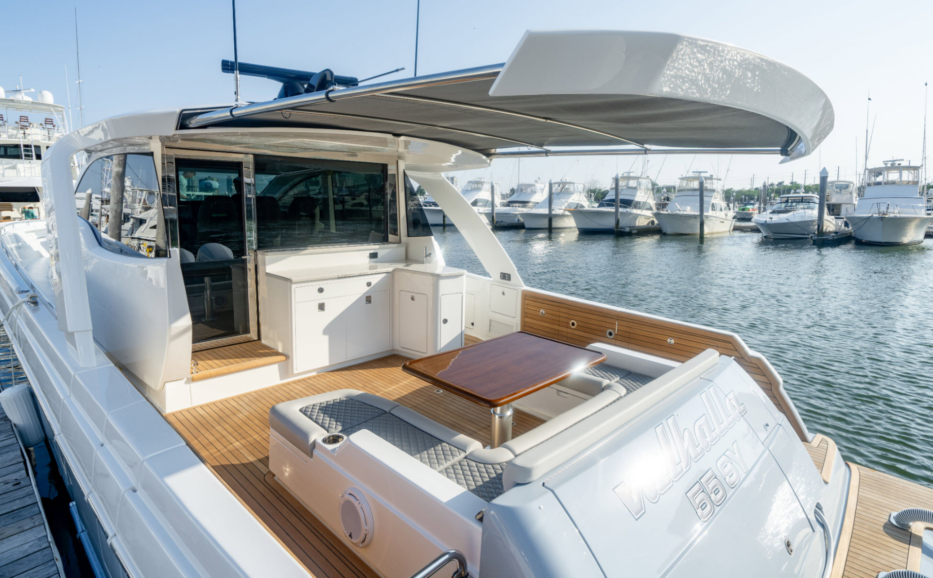 v55 sport yacht hardtop shade extended over cockpit
