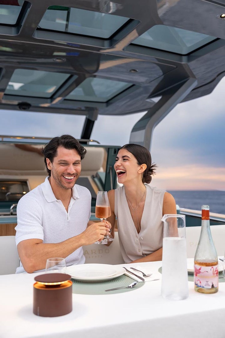 couple enjoying champagne on pardo 43
