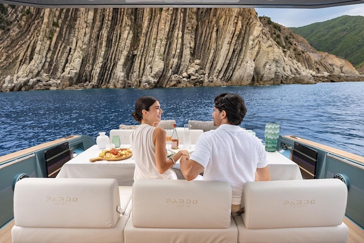 couple enjoying the aft deck of the pardo 43