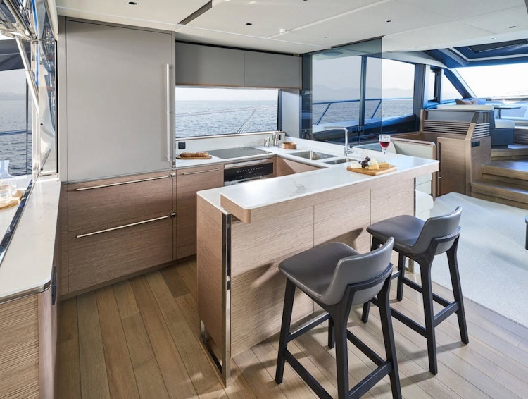 galley and bar with stools