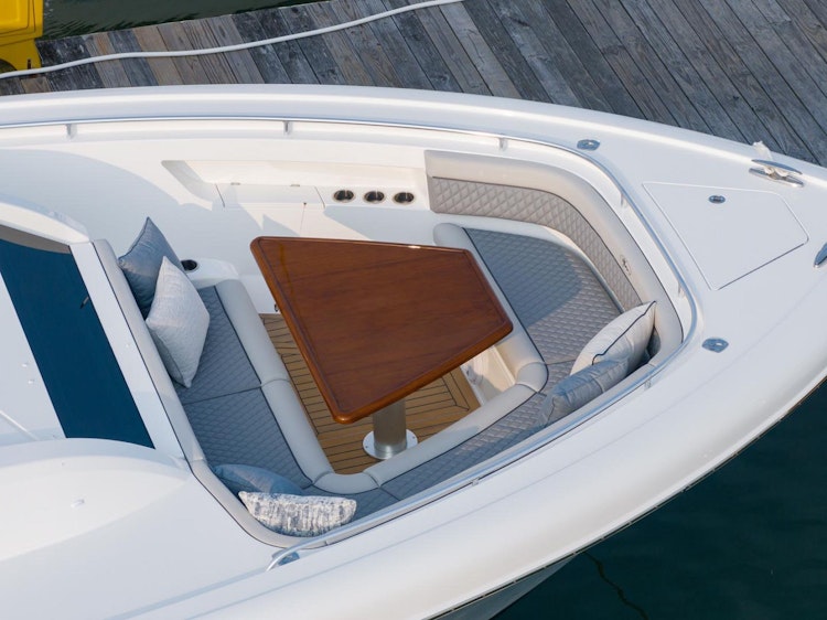 bow cushions and table with drink holders