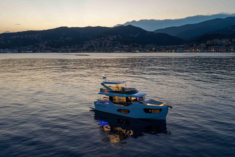 absolute navetta 50 at sunset with mountains in background