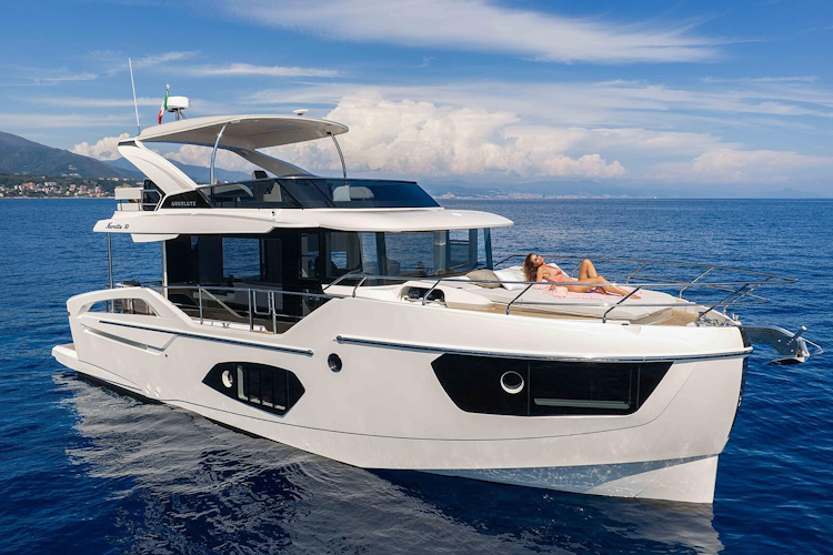 starboard profile of navetta 50 with woman on bow