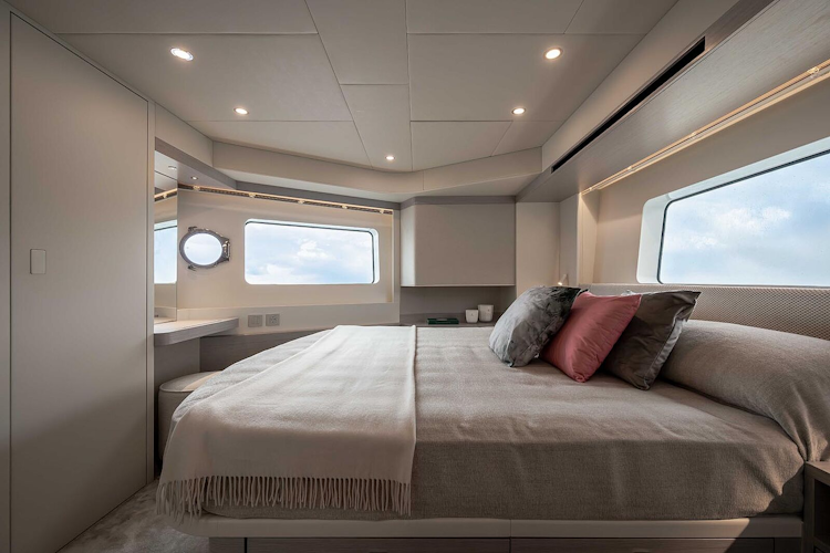 big windows and porthole in cabin of navetta 50