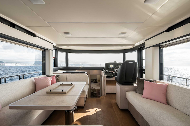 large windows near dining table in salon of navetta 50
