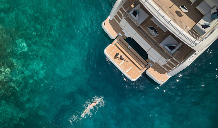woman-swimming-to-swim-platform-on-m8-evo
