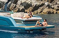 man laying on swim platform of pardo 43