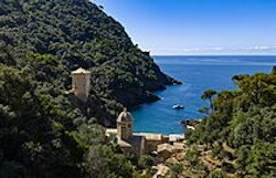 dramatic image of pardo 43 in distance near cliffs