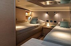 side-by-side beds in guest cabin