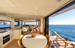 dining table and chairs near balcony door