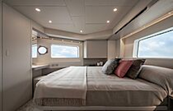 big windows and porthole in cabin of navetta 50