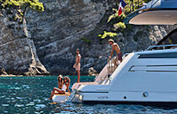 friends-enjoying-the-swim-platform-on-prestige-m7