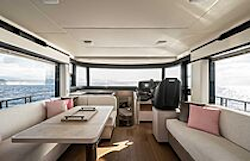 large windows near dining table in salon of navetta 50