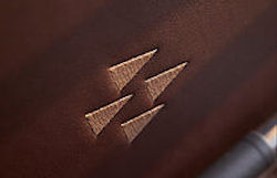 prestige logo stitch on interior sofa