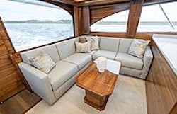 l-shaped couch in salon of viking 50c