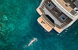 woman-swimming-to-swim-platform-on-m8-evo